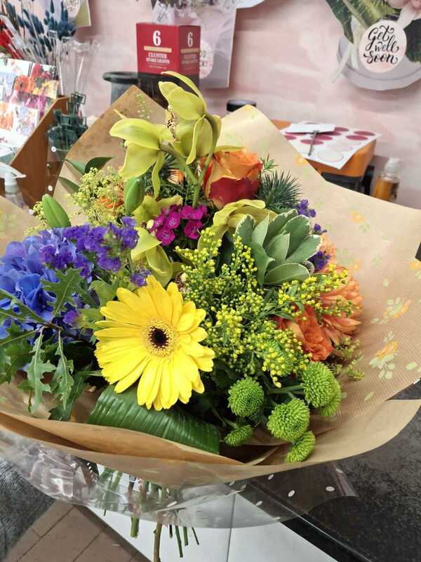 Colourful Hand Tied delivered by Hampsons Flowerworld 15 days ago