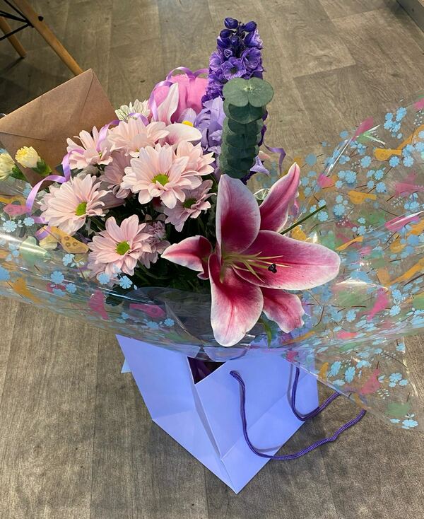 Florist Choice Handtied - Florist Choice Handtied in Water - Flowers and packaging decided by the delivering florist. Please be aware of Special Instructions