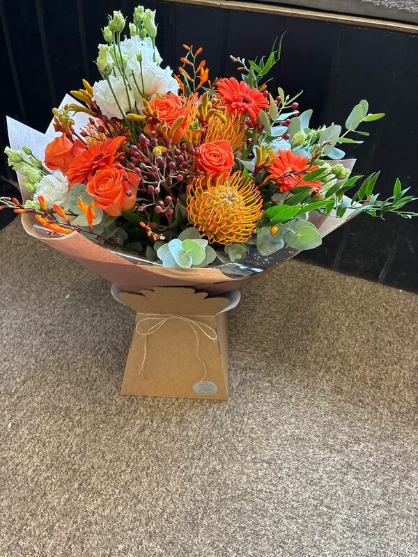 Orange burst delivered by A and S Flower Studio 9 days ago