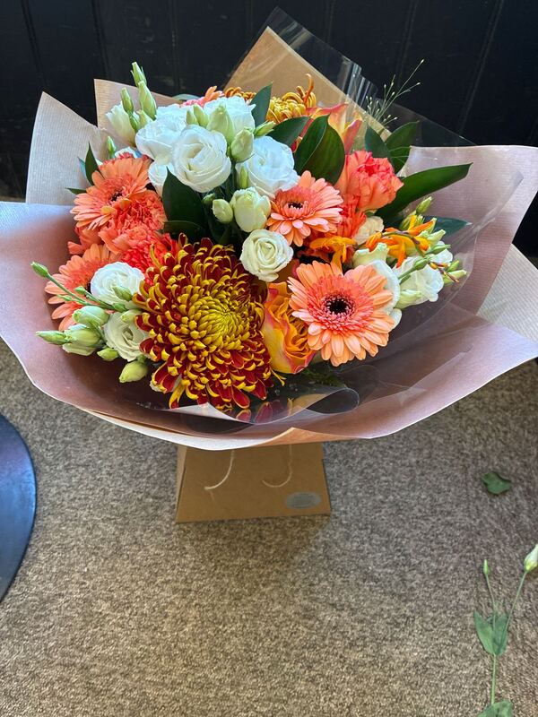 Orange burst delivered by A and S Flower Studio 3 days ago