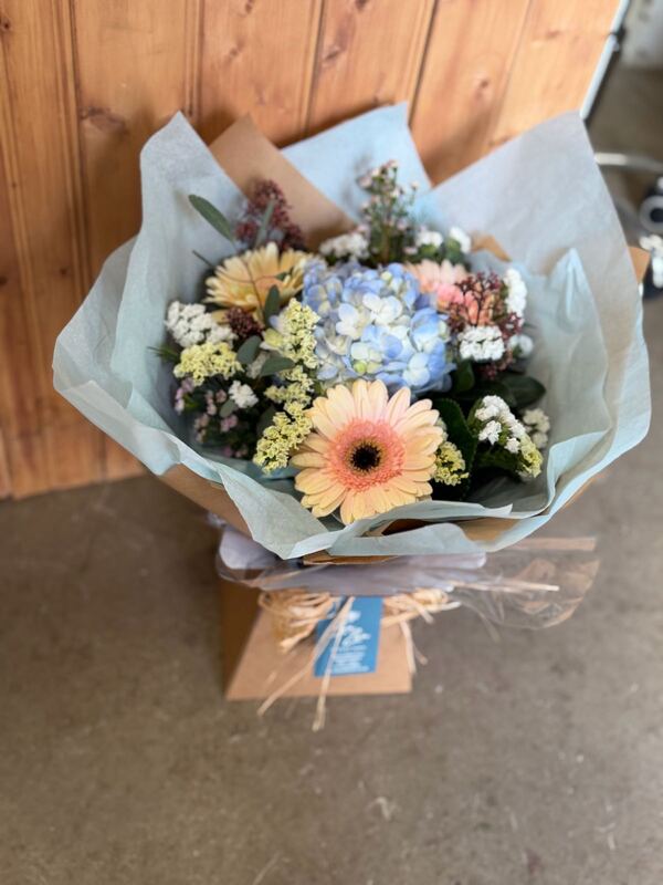 Florist Choice Handtied - Florist Choice Handtied in Water - Flowers and packaging decided by the delivering florist. Please be aware of Special Instructions delivered by Zsa Zsa Flower Barn in St Helens