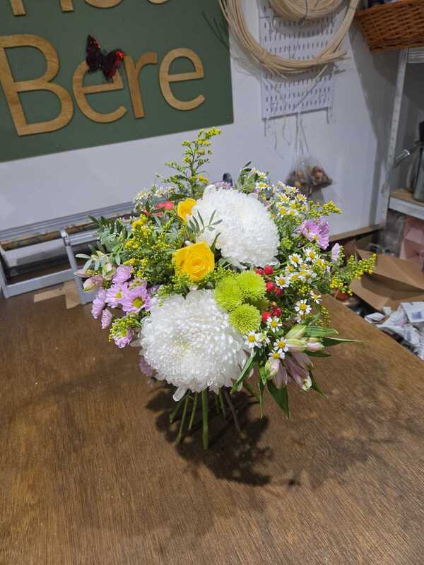 Florist Choice Handtied - Florist Choice Handtied in Water - Flowers and packaging decided by the delivering florist. Please be aware of Special Instructions delivered by The Florist Of Bere 5 days ago
