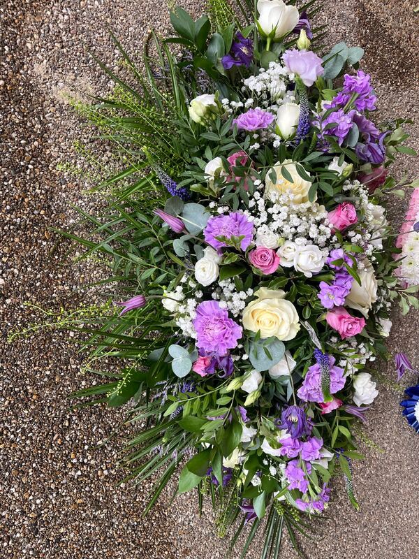 Lilac and cream coffin spray delivered by Berry Blooms New Forest 8 days ago