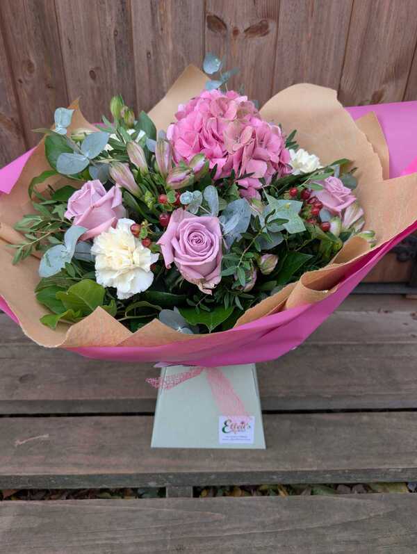 Florist Choice Handtied - Florist Choice Handtied in Water - Flowers and packaging decided by the delivering florist. Please be aware of Special Instructions delivered by Ellens Florist in Norwich