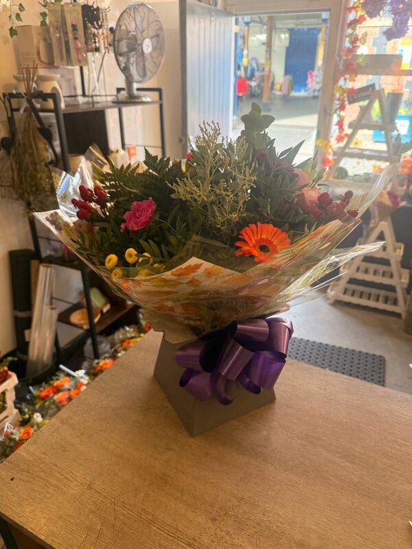 Florist Choice Handtied - Florist Choice Handtied in Water - Flowers and packaging decided by the delivering florist. Please be aware of Special Instructions delivered by Fletchers Flowers 1 day ago