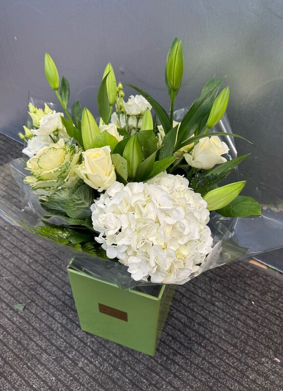 Enchanted Elegance delivered by Pursehouse Florist 5 hours ago