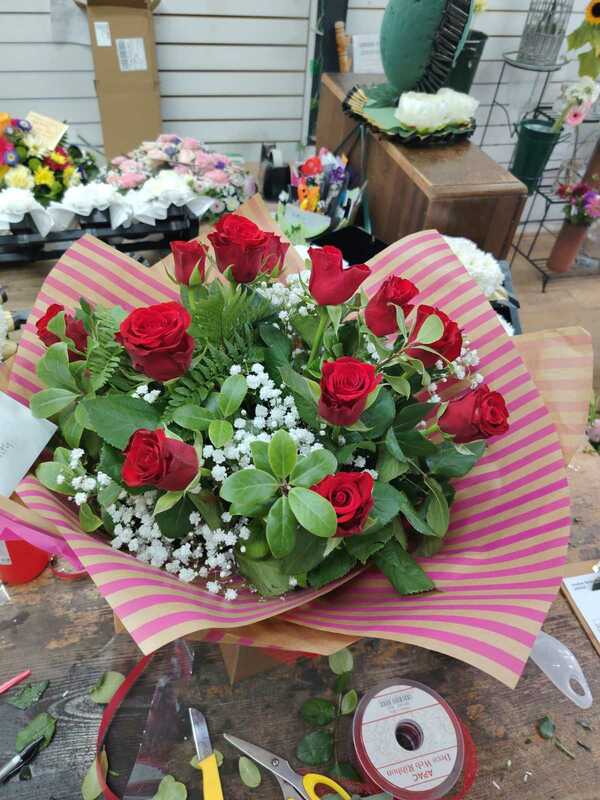 Custom Design - Dozen red roses delivered by Stems Florists 11 days ago