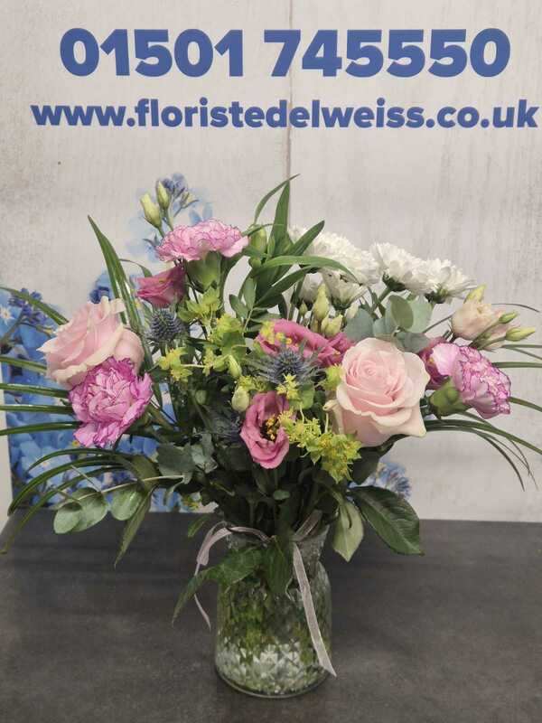 Wild Blossom delivered by Edelweiss Florist 5 days ago