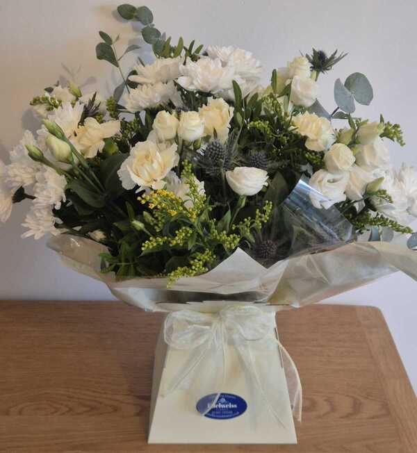 Scottish Creams delivered by Edelweiss Florist 2 days ago