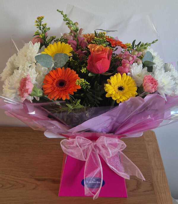 Rainbow Radiance delivered by Edelweiss Florist 14 hours ago