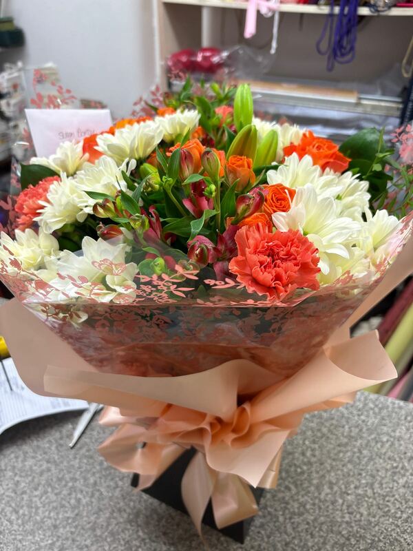 Florist Choice Handtied - Florist Choice Handtied in Water - Flowers and packaging decided by the delivering florist. Please be aware of Special Instructions
