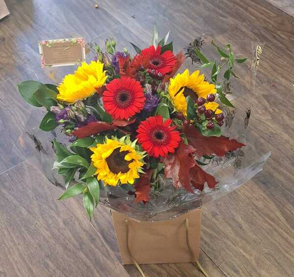 Ray of Sunshine delivered by The Garden Shop Florist Just now