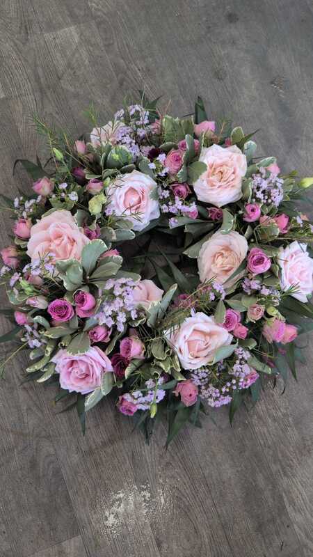 Wreath - Yellow, Pink & Purple delivered by Daisys Flower Boutique Just now