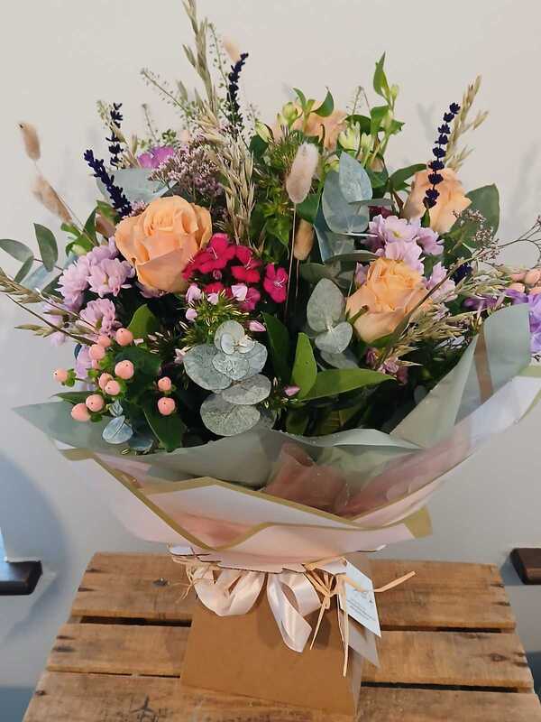 Florist Choice Handtied delivered by By Arrangement 17 hours ago