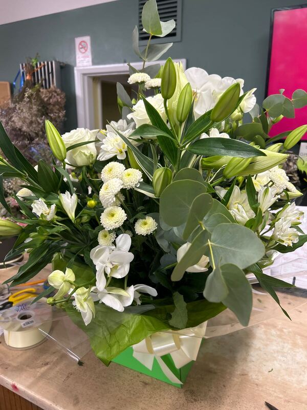 Sparkling Champagne Hand-Tie delivered by Bromborough Flowers Ltd 3 days ago