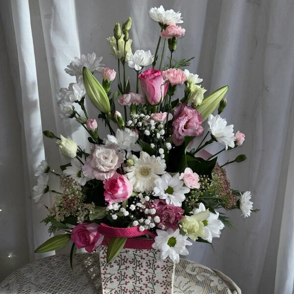 Bursting with Blooms delivered by Gwillim 12 hours ago