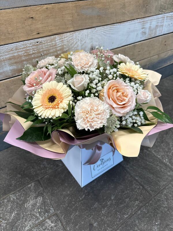peaches and creams delivered by Occasions Florist in Oldham