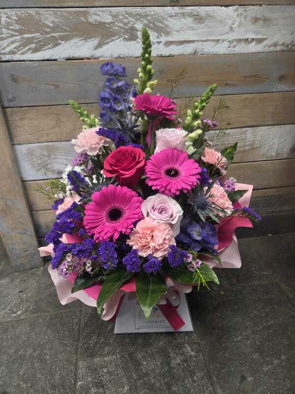 Vibrant Frontal delivered by Occasions Florist in Oldham