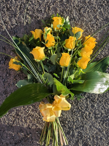 Tied sheaf yellow roses