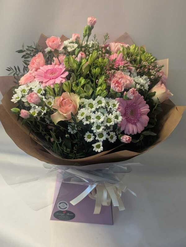 Handtied bouquet in pastel shades