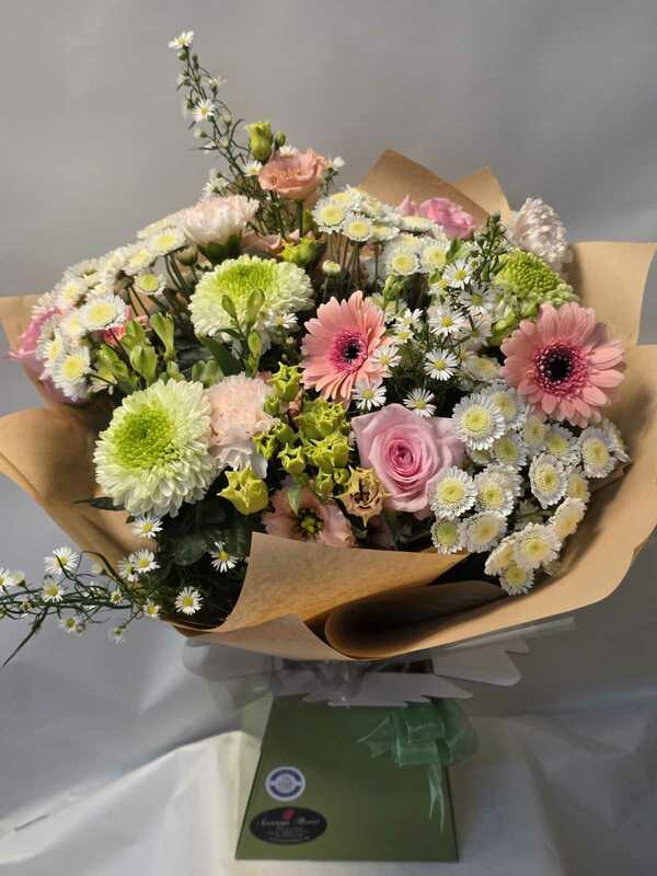 Handtied bouquet in pastel shades delivered by Six Ways Florist 14 days ago