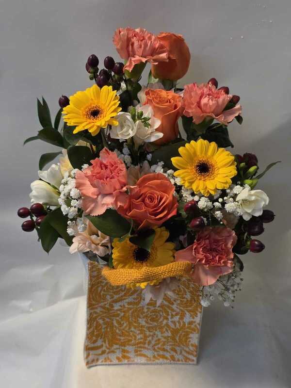 sweet gift bag arrangement delivered by Six Ways Florist 12 days ago