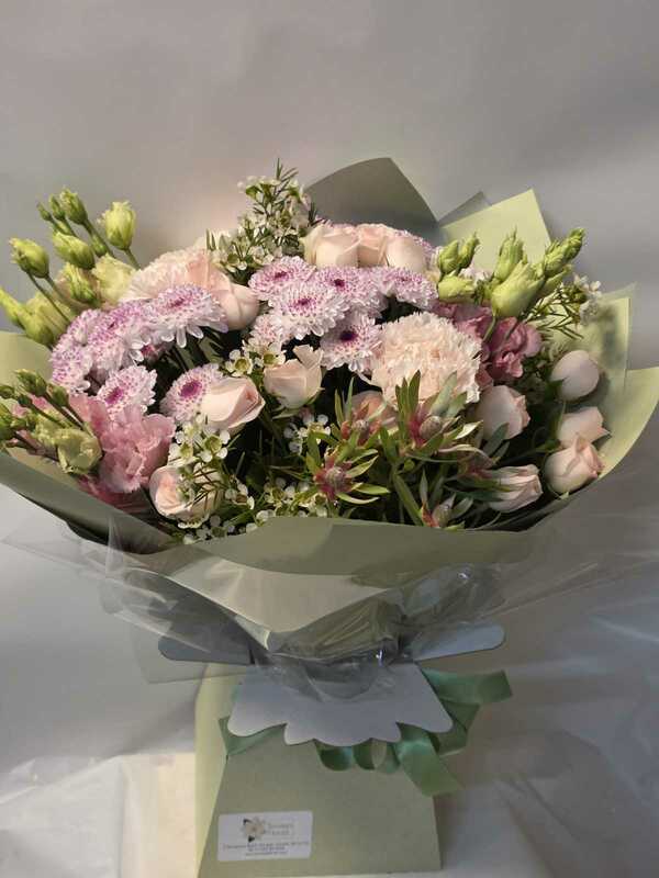 bouquet in softer shades, flowers delivered by Six Ways Florist in Llanelli