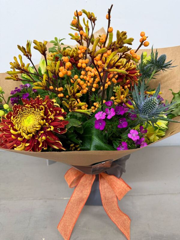 Florist Choice Handtied - Florist Choice Handtied in Water - Flowers and packaging decided by the delivering florist. Please be aware of Special Instructions delivered by Flower Workshop in Abingdon